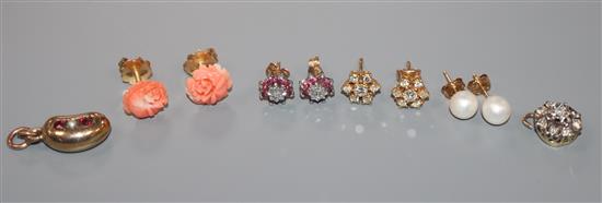 Two pairs of 18ct gold and gem set ear studs including diamond cluster, a 14k pair, a 9ct pair, a 9ct bean charm and a pendant.